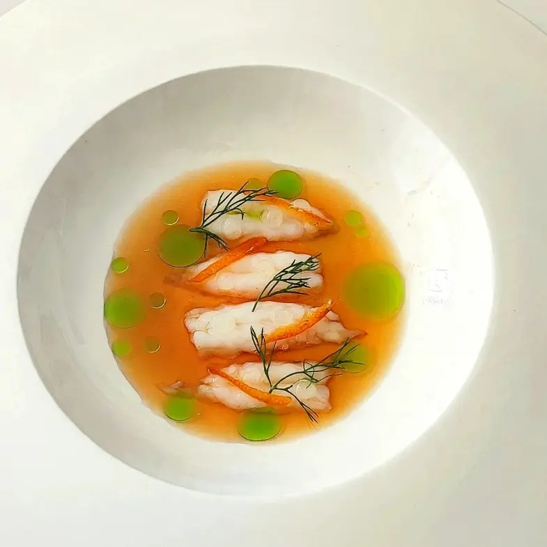 creation thumb for Scampi with a Consommé of Toasted Bread and Charred Onion