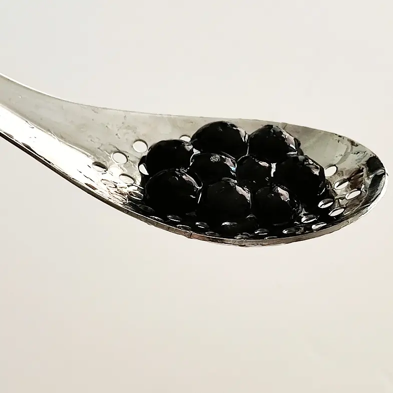 creation thumb for Frozen reverse spherification: Cuttlefish Ink Pearls