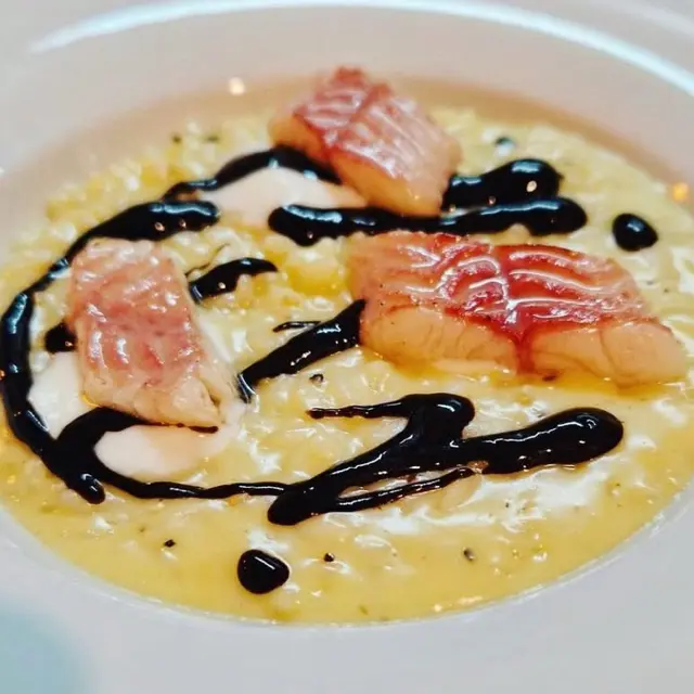 creation thumb for Acquerello Risotto with Smoked Eel and Black Garlic Emulsion