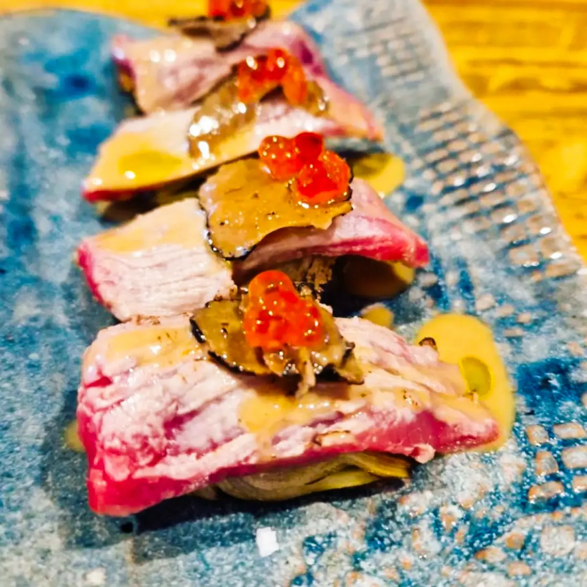 creation thumb for Flamed Bluefin Tuna Sashimi,artichokes,truffle,salmon roe