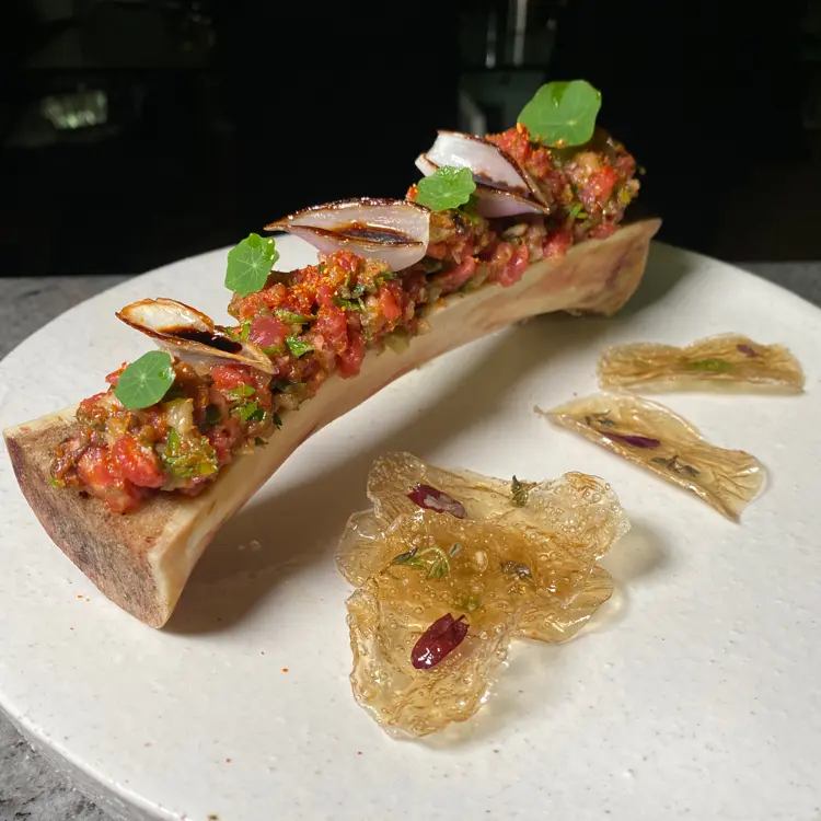 creation thumb for Bone Marrow Steak Tartare with glass herb chips