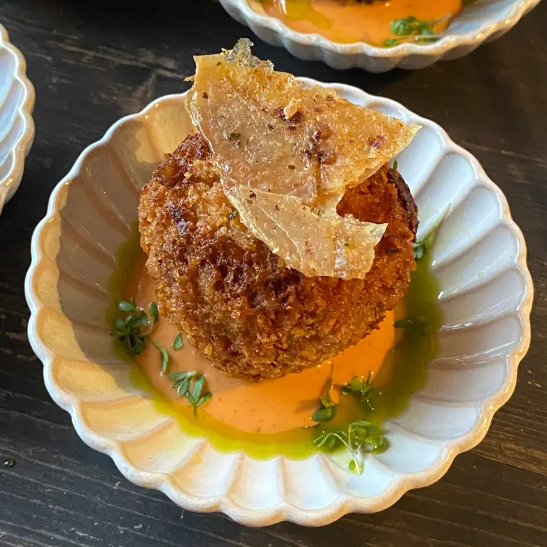 creation thumb for Ras el hanout chicken croquette, harissa mayo, parsley oil