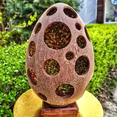 creation thumb for Every day our hen develop an chocolate egg.
