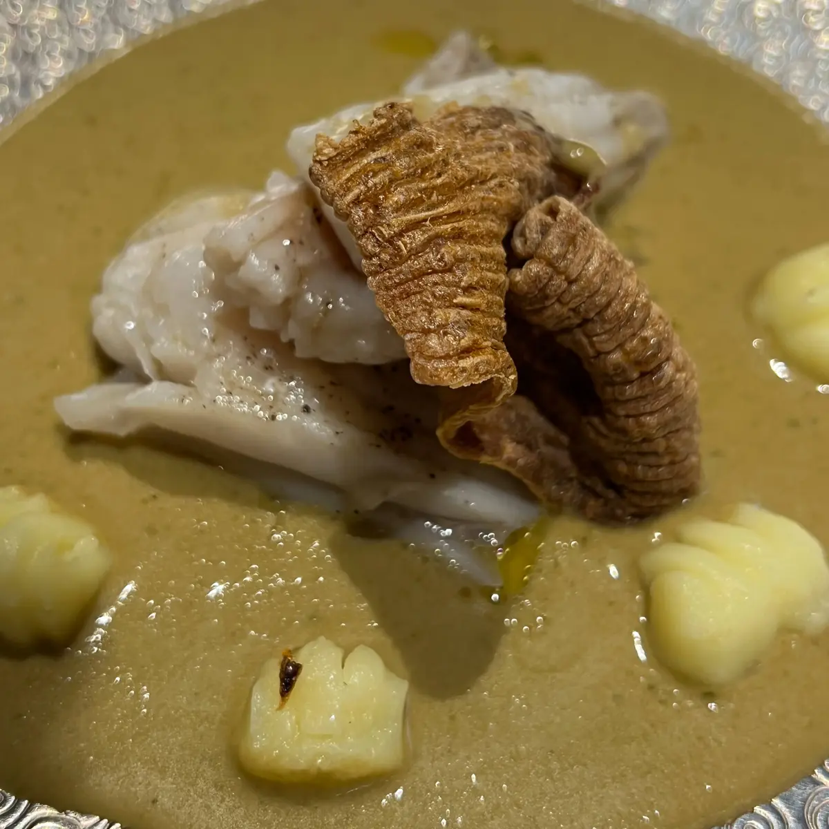 creation thumb for Pattinare con suquet di frutti di mare e gnocchi
