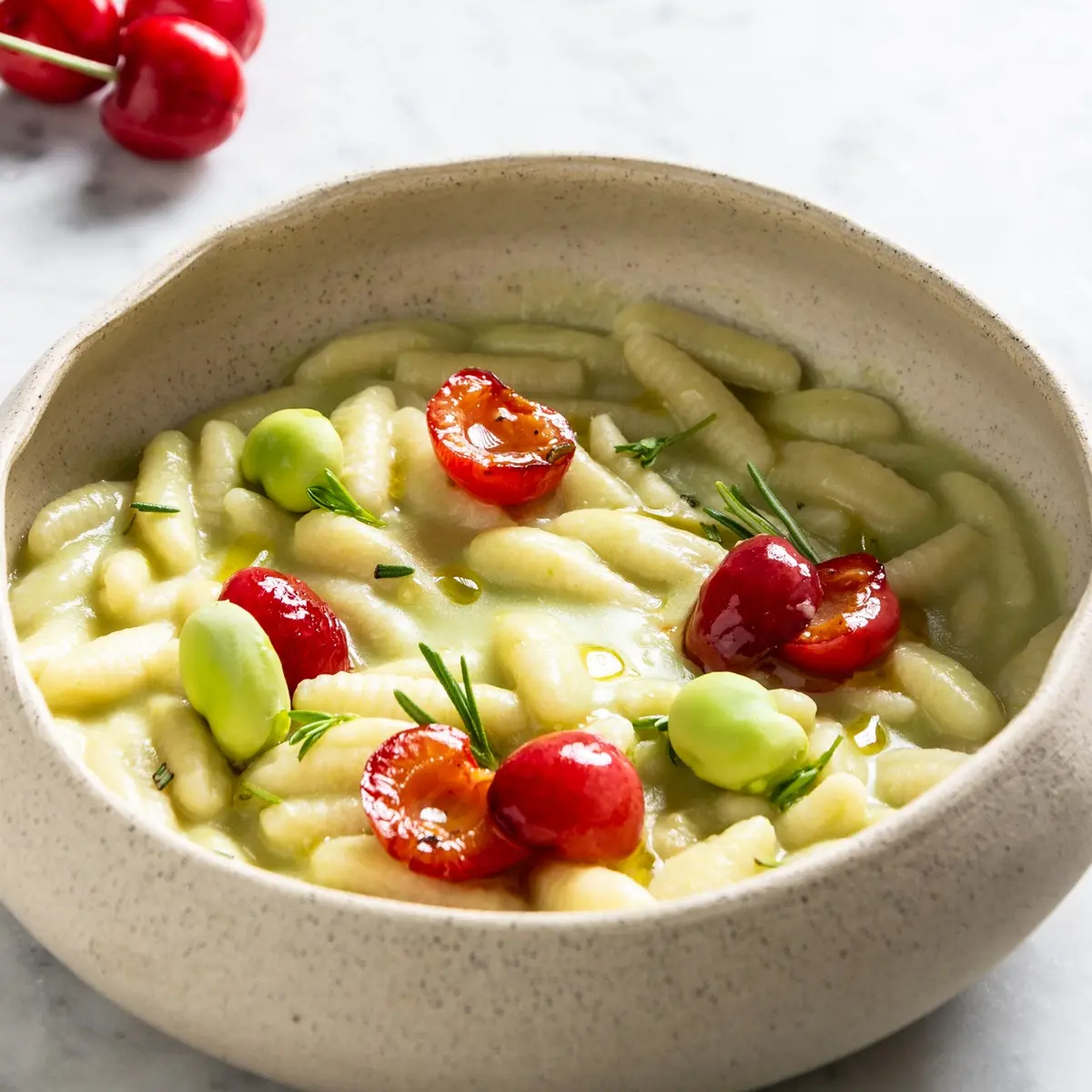 creation thumb for Risotto-Style Pasta with Parmesan Broth, Fresh Fava Bean Cream and Rosemary-Sautéed Cherries