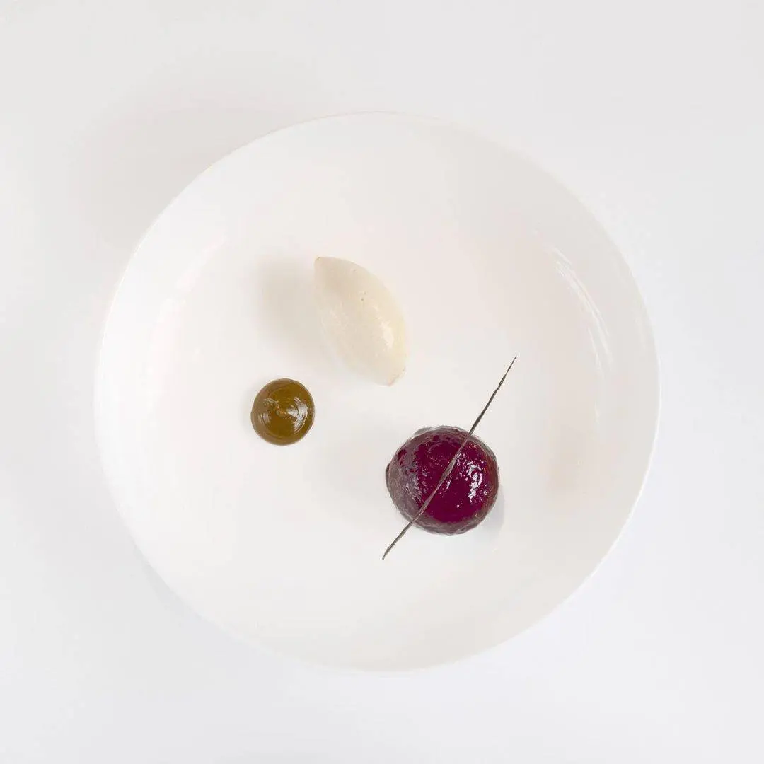 creation thumb for Red wine poached plums with vanilla and cinnamon,umeboshi jam, pain d’ epices purée and tuile, toasted biscuit icecream