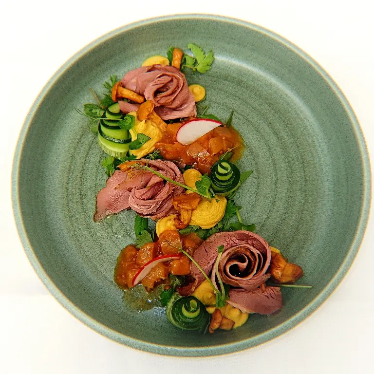 creation thumb for Duck pastrami on a bed of lettuce and peach chutney