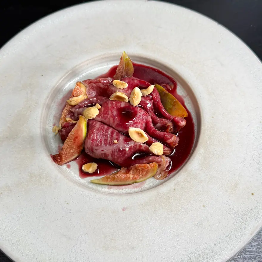 creation thumb for Smoked Angus Caramelle with Caprino, Spiced Red Wine & Fig