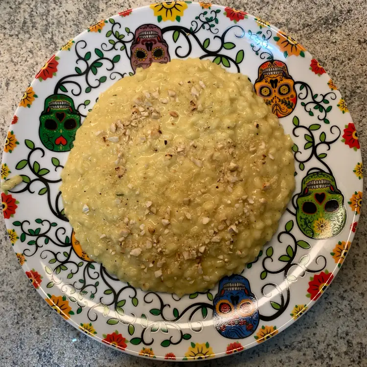 creation thumb for Turmeric risotto with cumbava dust and cashews