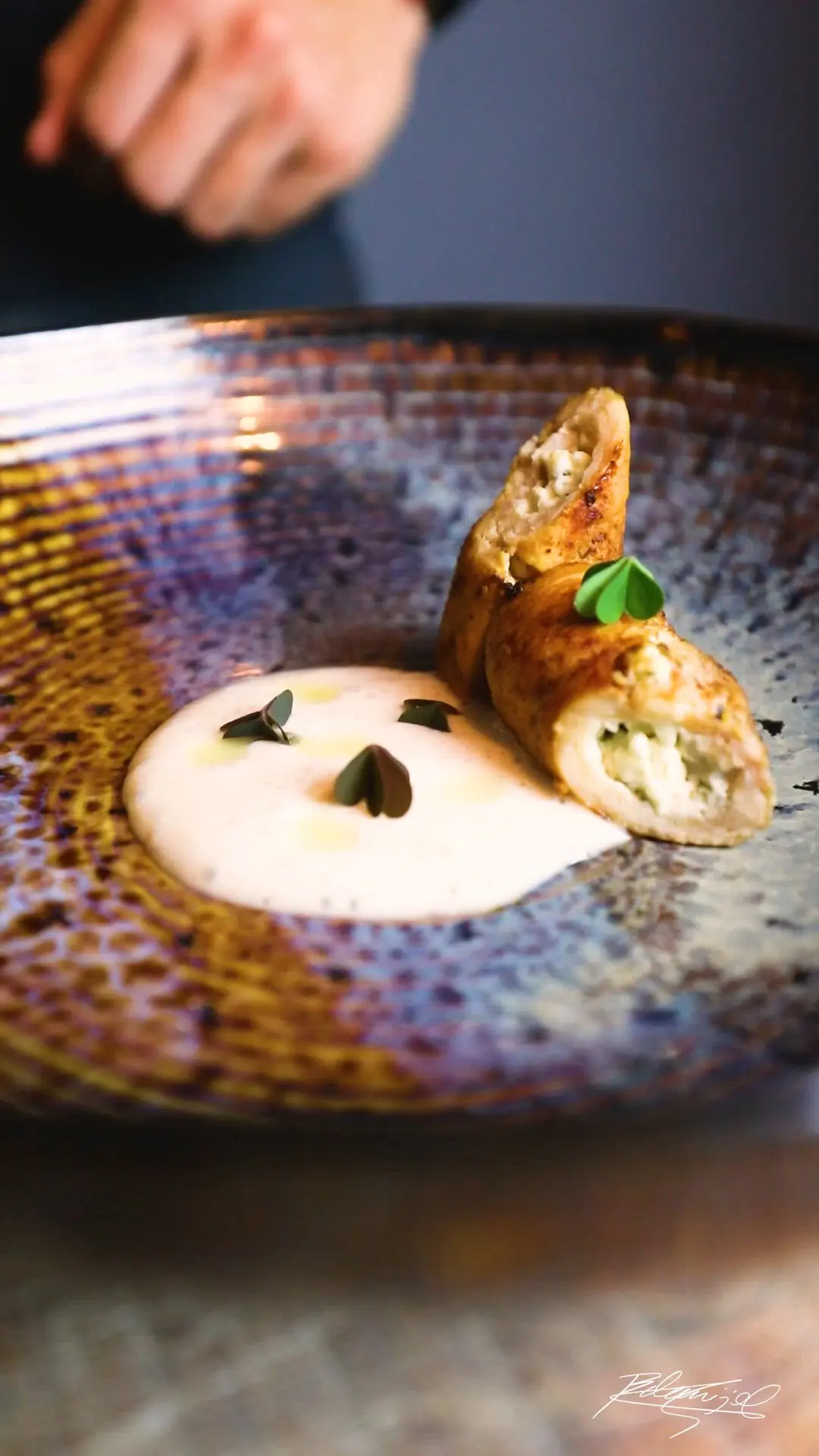 creation thumb for Chicken roll with almond cream and grape tendrils oil