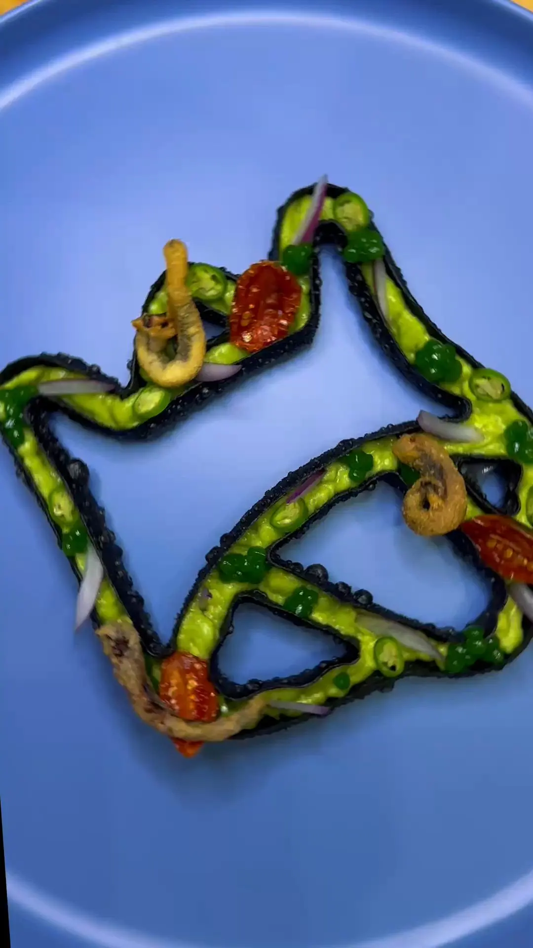 creation thumb for Buñuelo di Tinta di Calamaro con Guacamole Deconstruito