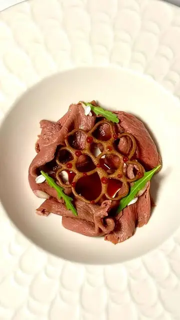 creation thumb for Rinderherz Carpaccio mit Tomatensauce