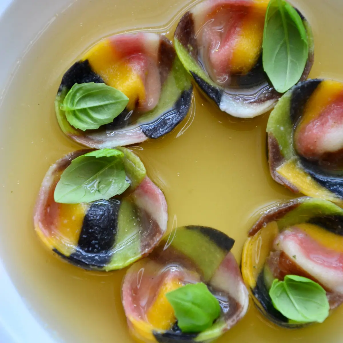 creation thumb for Multicolored tortellini with burrata & tomato consommé