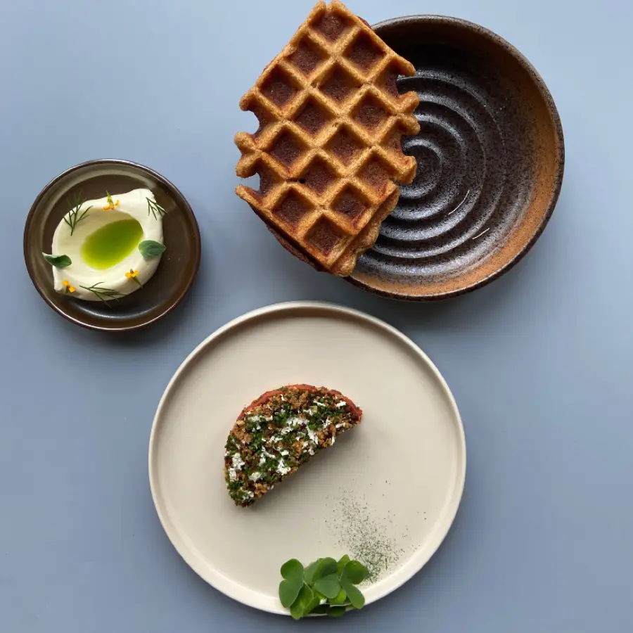 creation thumb for mushroom tartar with horseradish,crispy onions and a waffle made of koji flour , topped with vegan miso butter🌱