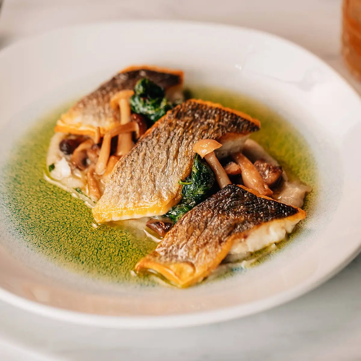 creation thumb for Seabass, Jerusalem artichoke, pickled mushroom and spinach