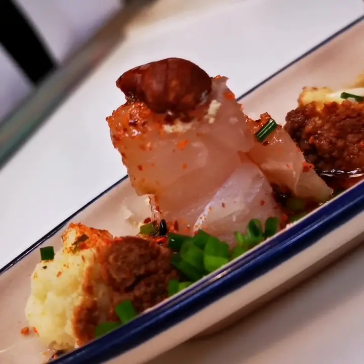creation thumb for  Crudo de corvina Mantequilla avellanada y marañón 