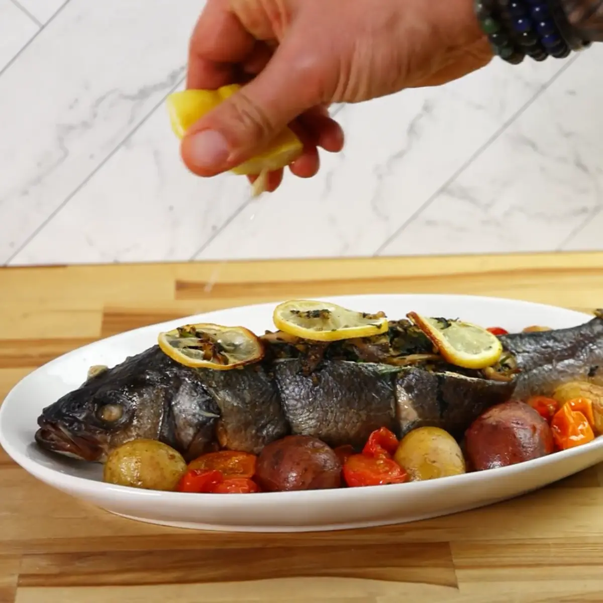 creation thumb for Branzino Relleno con Tomates Asados y Papas al Limón
