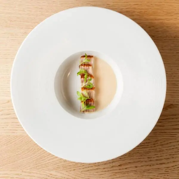 creation thumb for Scallops and pig's trotters in toasted millefeuille, with caviar and "cocido" soup