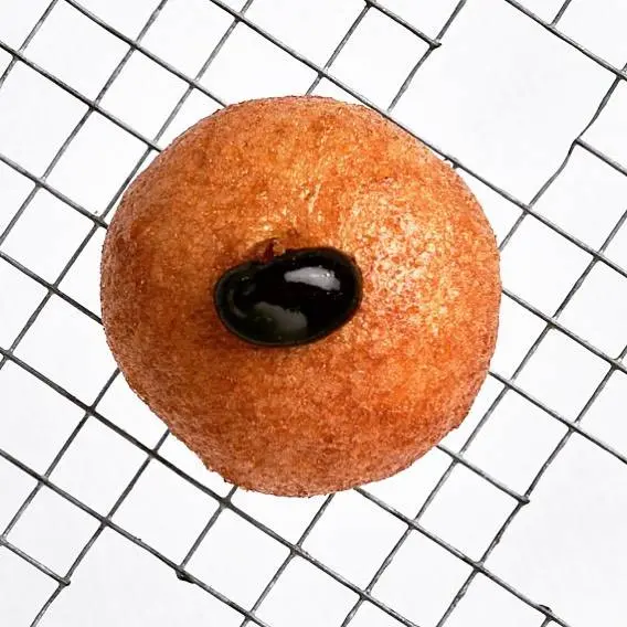 creation thumb for Truffled Egg Yolk Buñuelo