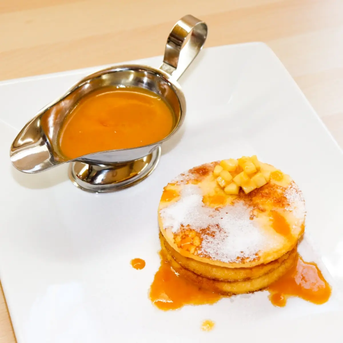 creation thumb for Pancakes with apple brunoise, sugar powder and caramel sauce