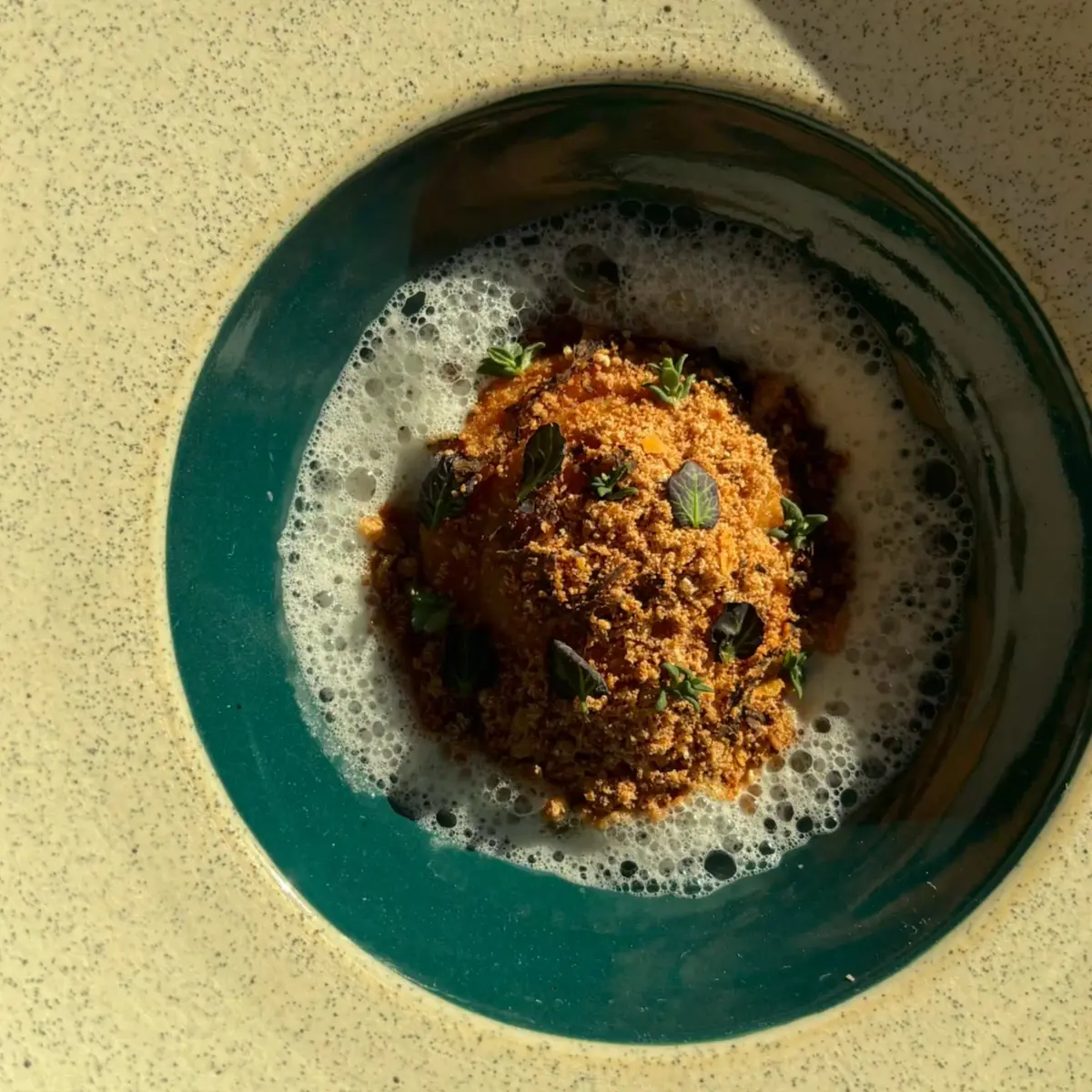 creation thumb for Raviolo di Tuorlo d'Uovo con Pane Avanzato, Tartufo & Pelle di Pollo