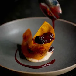 A plated chocolate mousse dessert