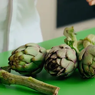 A cooked artichoke