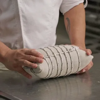 A lievito madre wrapped in string