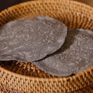 A basket of blue corn tortillas