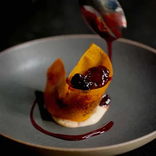 A plated chocolate mousse dessert