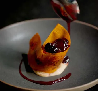 A plated chocolate mousse dessert